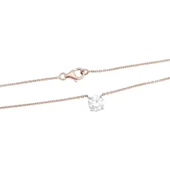 Collier solitaire deux ors, diamants.