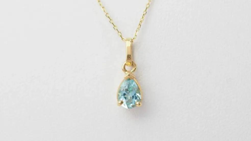 Collier solitaire or jaune topaze bleue