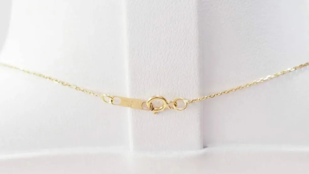 Collier solitaire or jaune topaze bleue