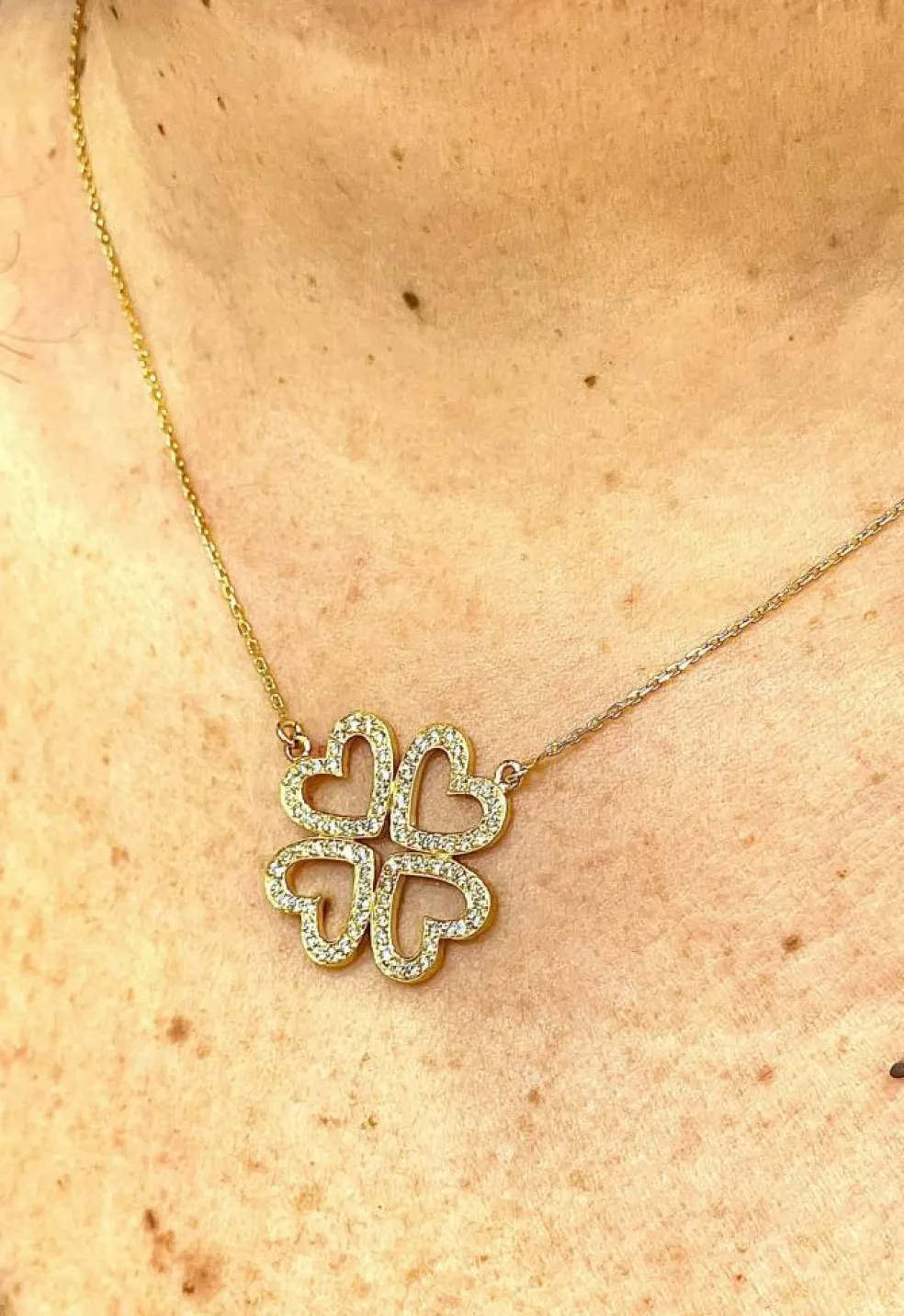 Collier trèfle à 4 cœurs en or jaune 18 carats et diamants