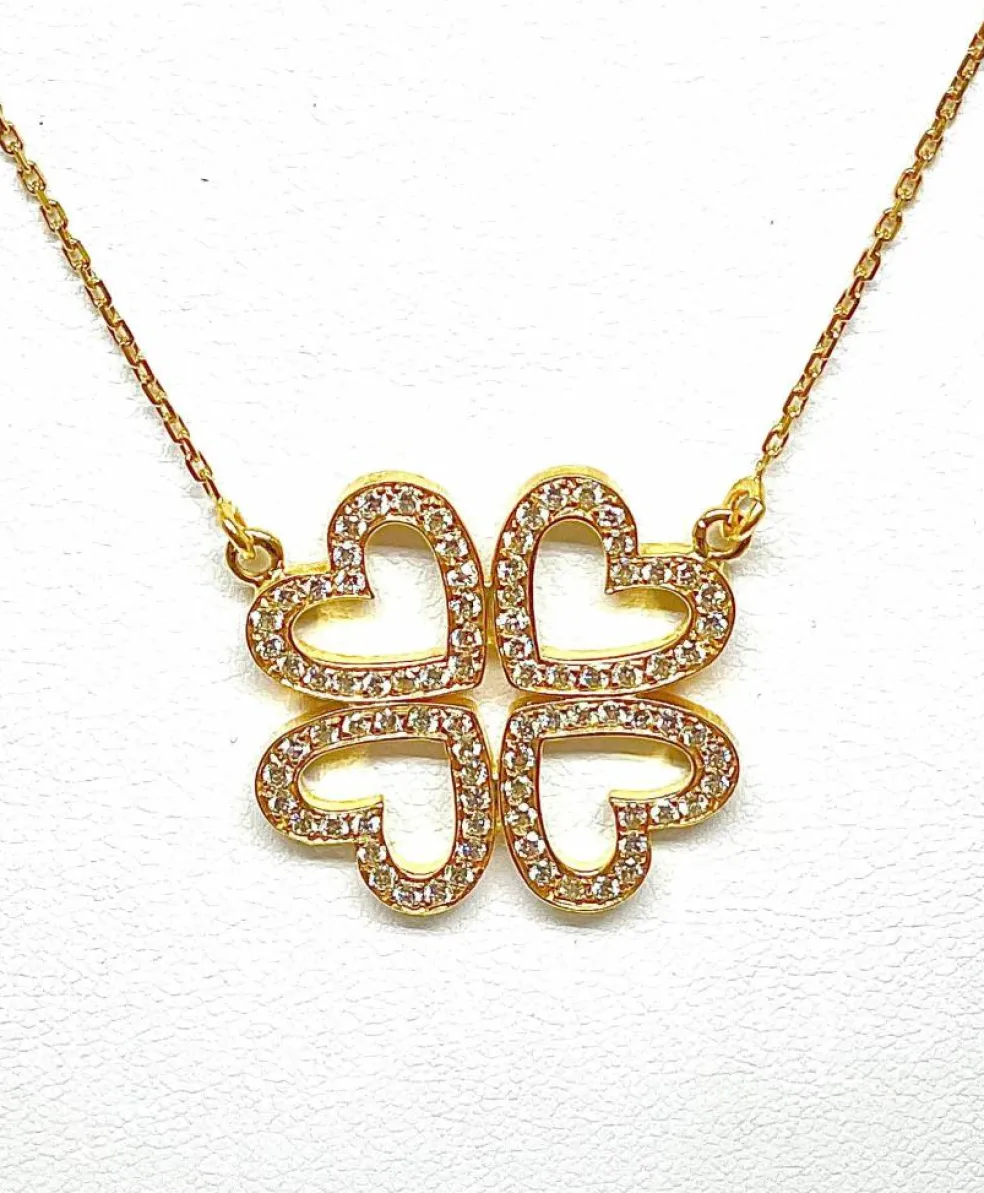 Collier trèfle à 4 cœurs en or jaune 18 carats et diamants