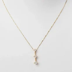 Collier trilogie en or jaune et diamants princesse