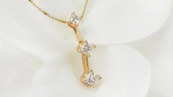 Collier trilogie en or jaune et diamants princesse