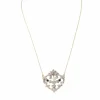 Collier volutes en or jaune et argent, grenat diamants et perle