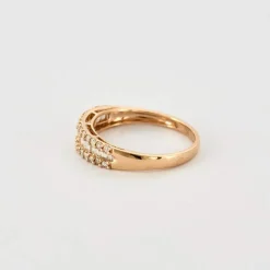 Demi alliance en or rose et diamants