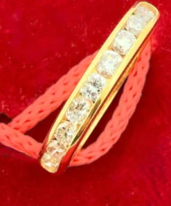 Demi-alliance en or jaune et diamants
