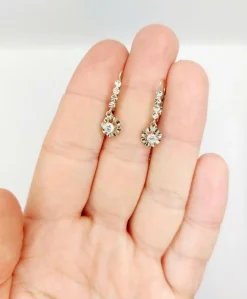 Dormeuses or blanc et platine, diamants (circa 1930)