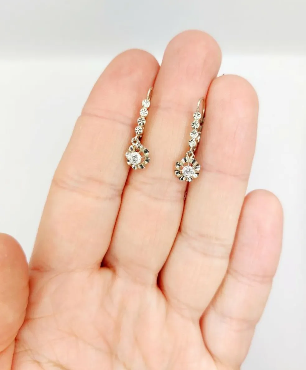 Dormeuses or blanc et platine, diamants (circa 1930)