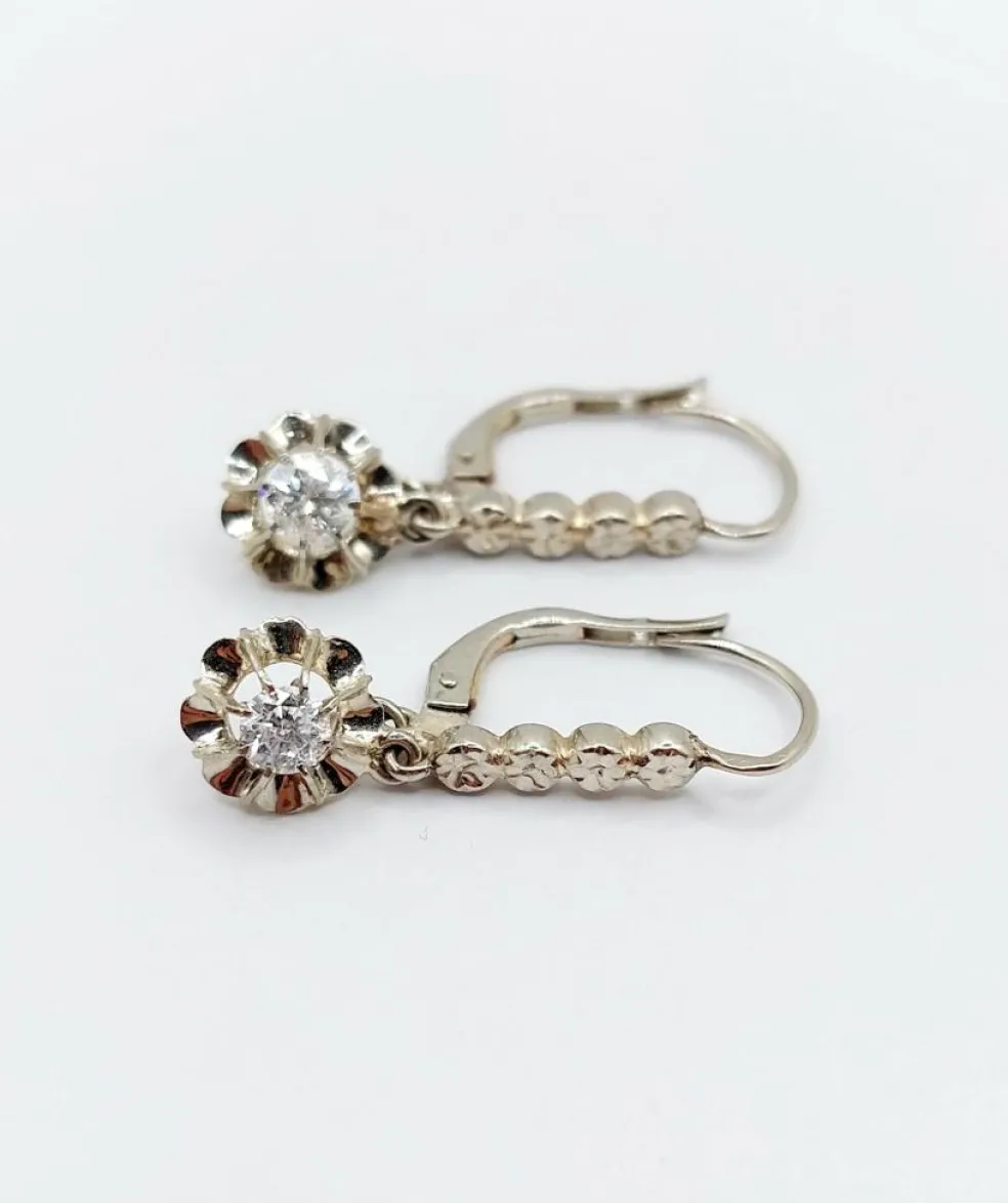 Dormeuses or blanc et platine, diamants (circa 1930)