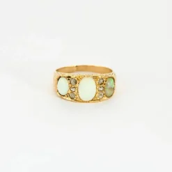 Elégante Bague Jarretière Or Jaune, Opale et Diamants