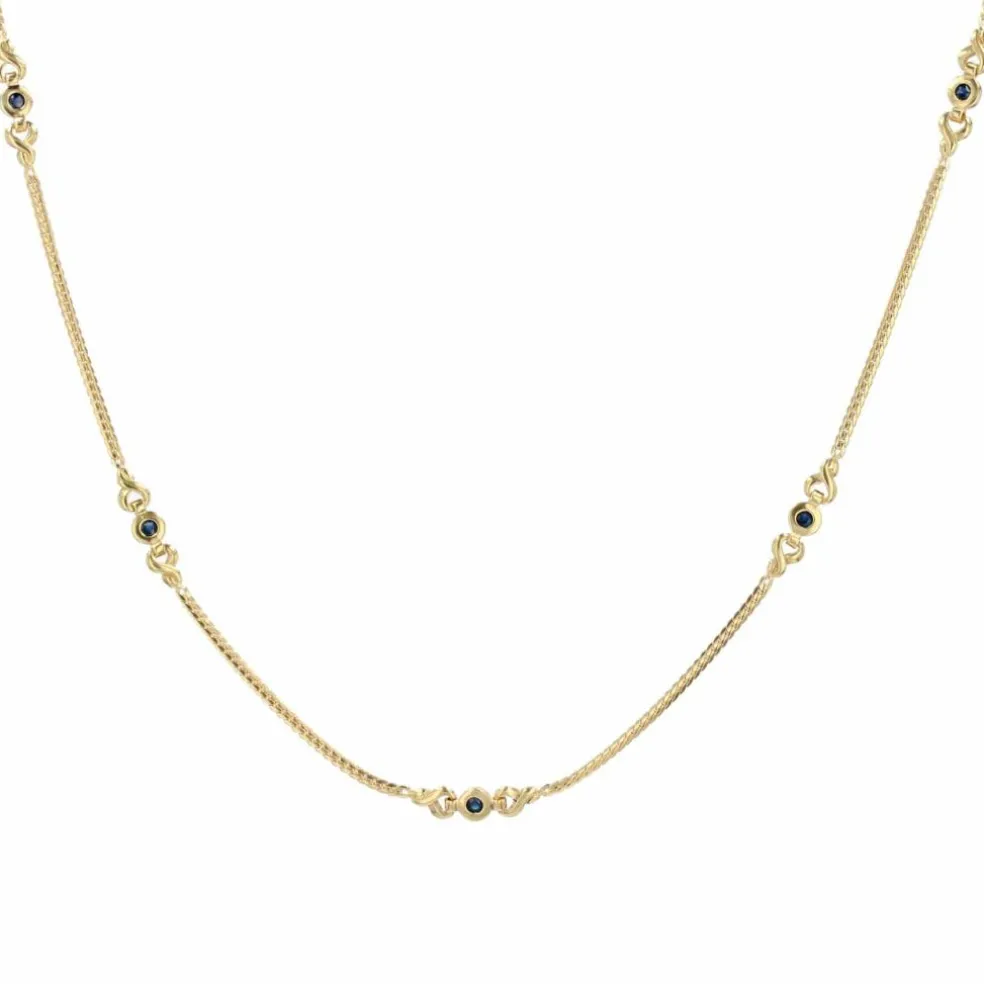 Fin collier or maille gourmette plat et ses motifs avec saphirs