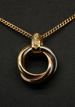 Gold diamond trio d'anneaux pendant