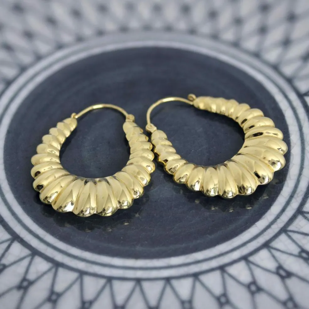 Grandes boucles d'oreilles créoles en or jaune godronné