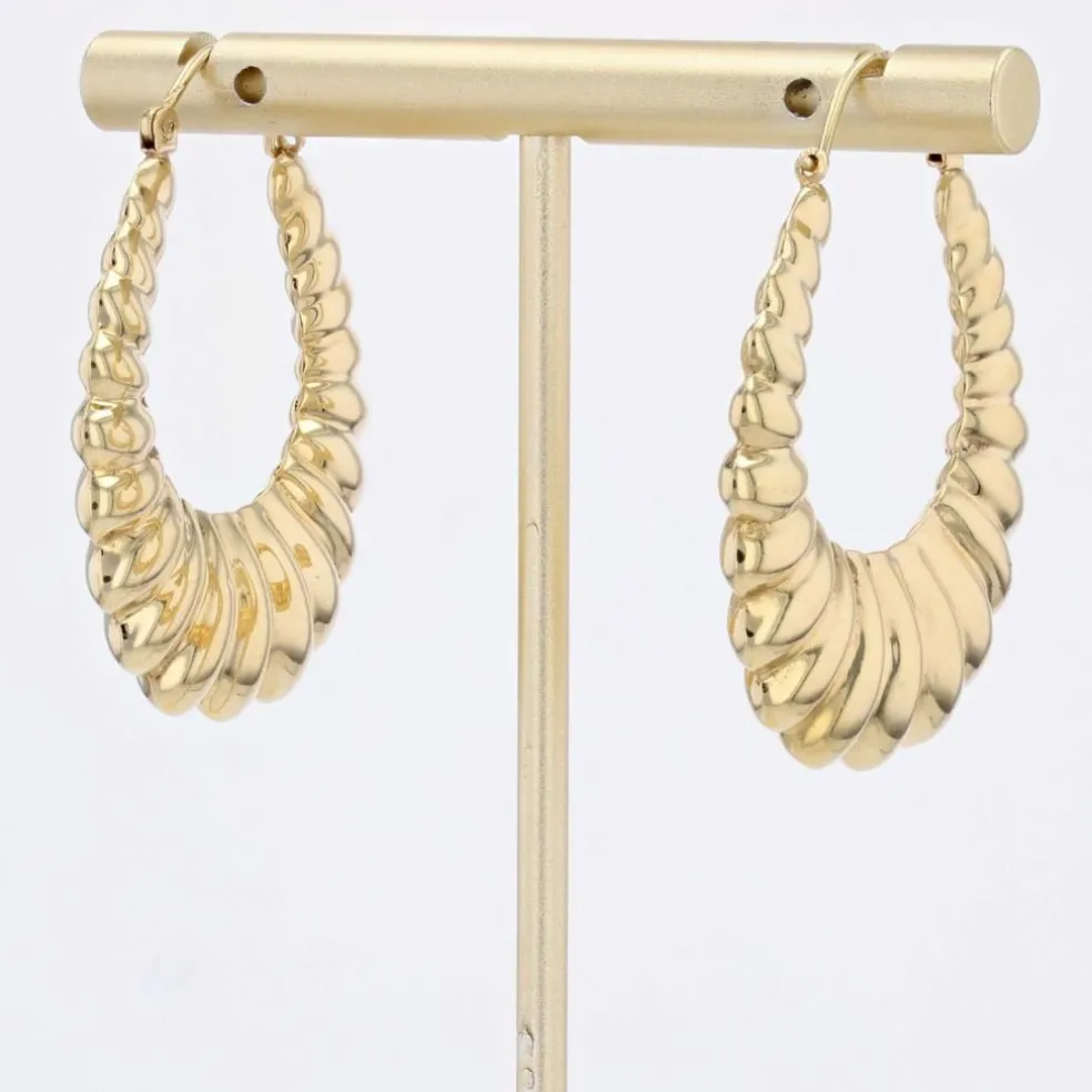 Grandes boucles d'oreilles créoles en or jaune godronné