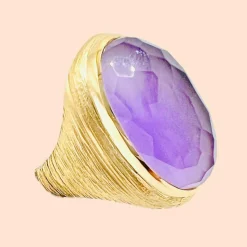 Importante bague en or 18 carat sertie d'une améthyste facettée