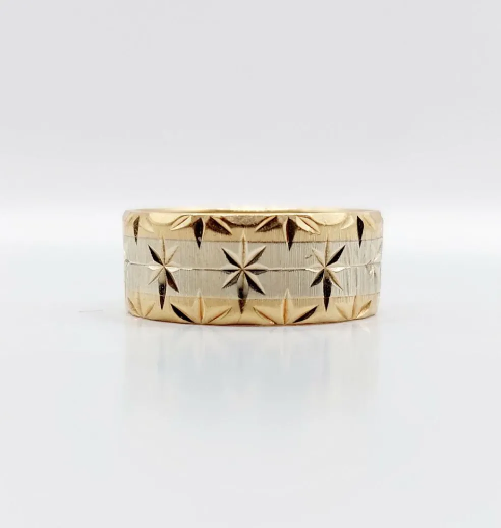 Large bague jonc alliance or rose et gris ciselée de motifs étoilés
