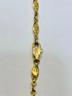 Long collier or jaune maille filigrane