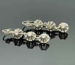 Longues dormeuses or gris serties de diamants