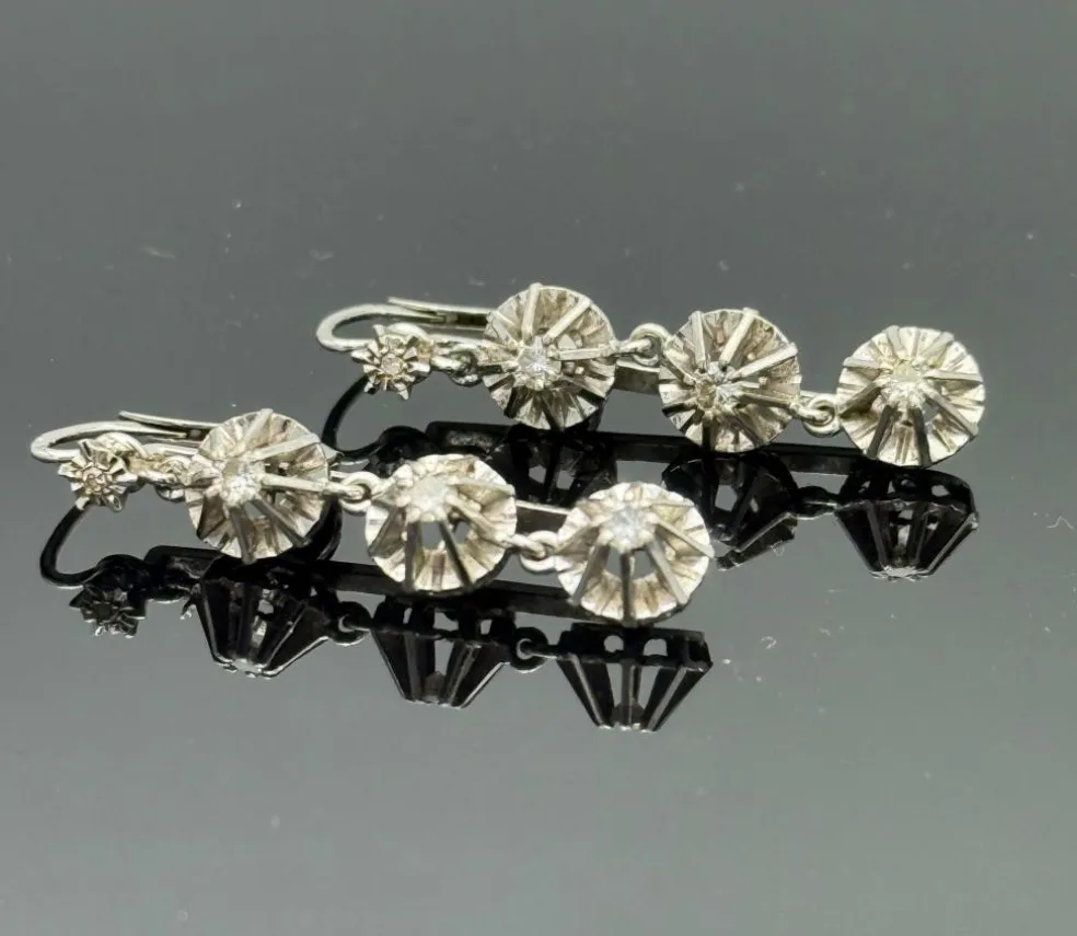 Longues dormeuses or gris serties de diamants