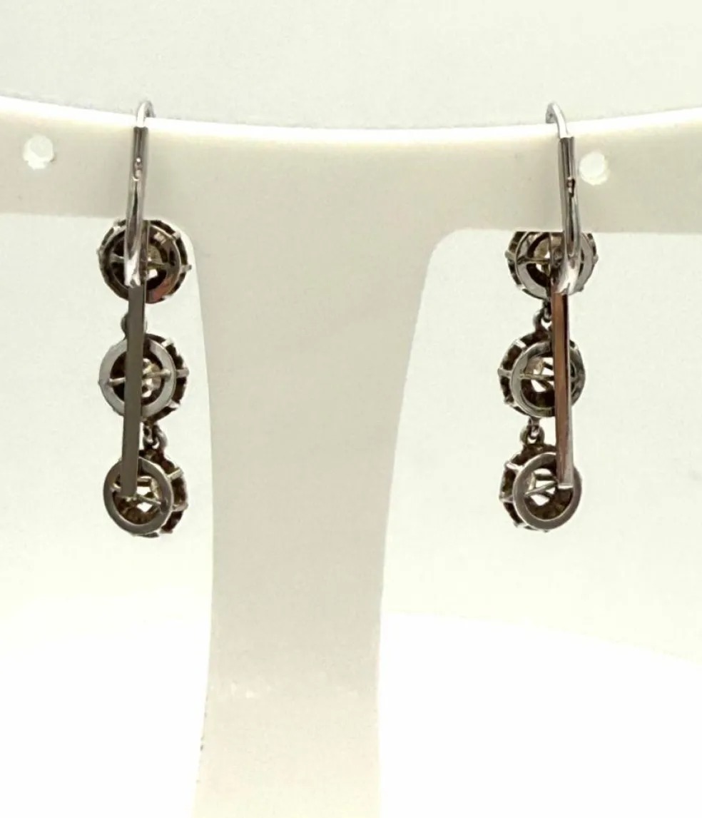 Longues dormeuses or gris serties de diamants
