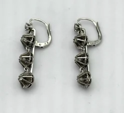 Longues dormeuses or gris serties de diamants