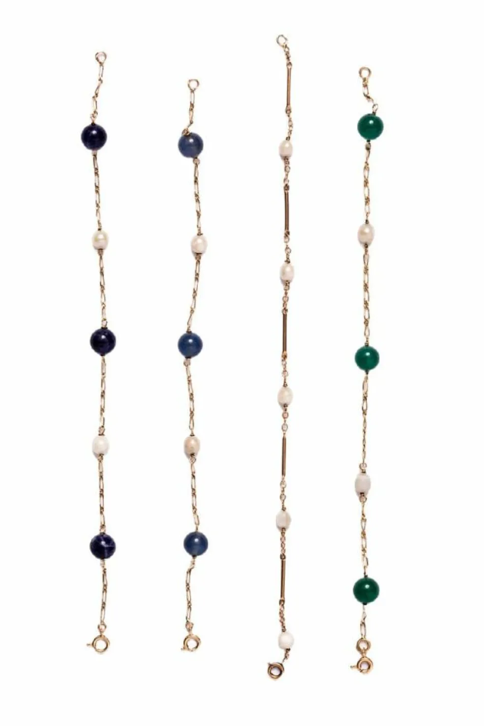 Lot de quatre bracelets en or jaune et perles