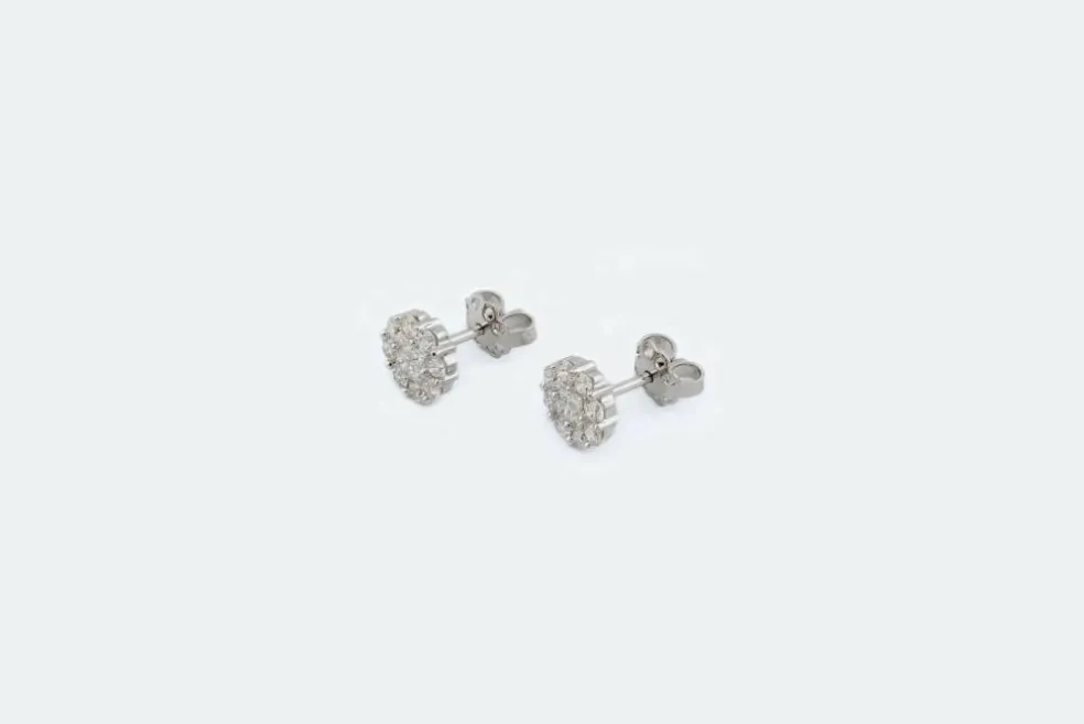 Marguerites en or blanc avec diamants