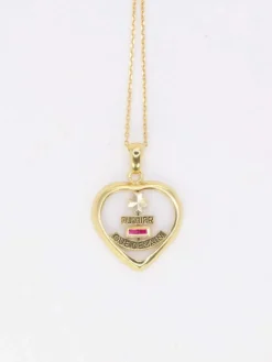 Médaille amour Augis coeur en verre et or, Plus qu’hier moins que demain, ca 1980
