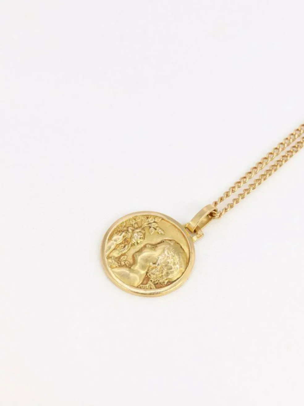 Médaille ancienne en or figurant la fillette à la rose