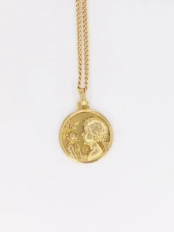 Médaille ancienne en or figurant la fillette à la rose