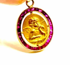 Médaille ange en or jaune 18 carats, datée 1927