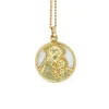 Médaille religieuse vintage nacre et or jaune