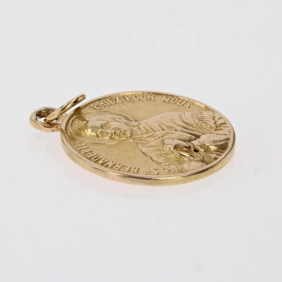 Médaille Sainte Bernadette or jaune