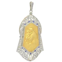 Médaille vintage des années 1910 Pendentif en or 18 carats serti de diamants, saphirs et perles Saint Antoine de Padoue représenté tenant l'Enfant Jésus