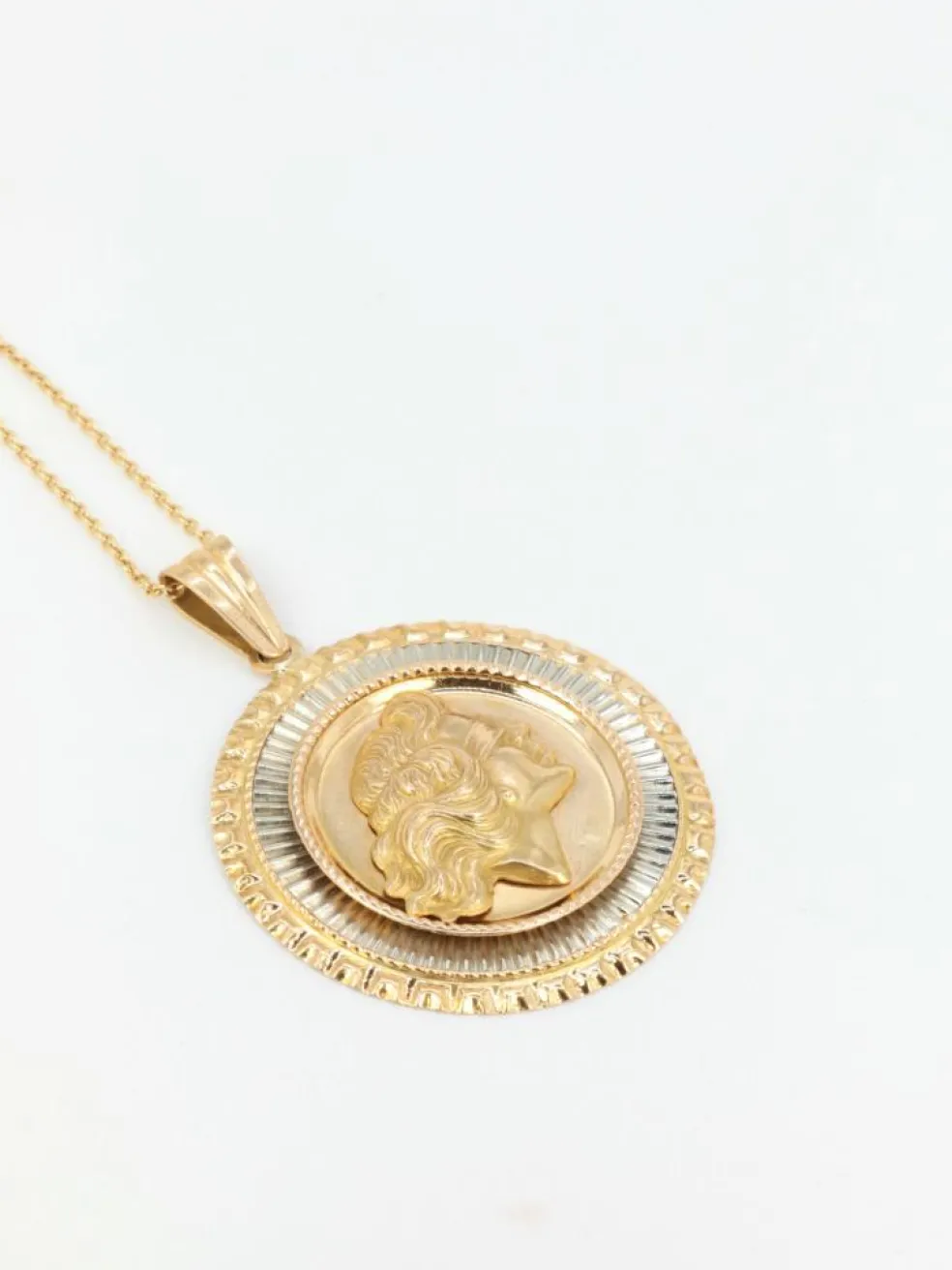 Médaille vintage en or jaune et blanc