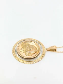 Médaille vintage en or jaune et blanc