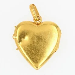 Médaillon ancien coeur ciselé rubis et perles fines