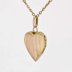 Médaillon coeur or rose