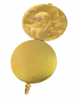 Médaillon porte-bonheur avec diamants