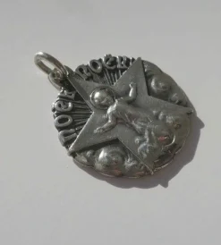 MELLERIO - Pendentif médaille Noël Etoile Argent