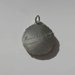 MELLERIO - Pendentif médaille Noël Etoile Argent