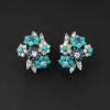Paire de boucles d'oreilles en or et platine sertie de diamants, turquoises et diamants. Alfred HANNE