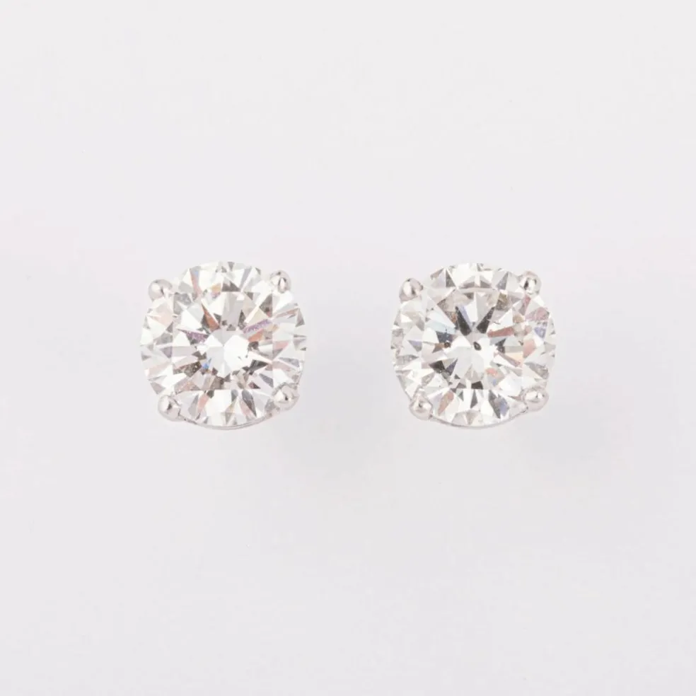 Paire de puces diamant sur or gris 4 griffes