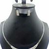 Parure or gris diamants