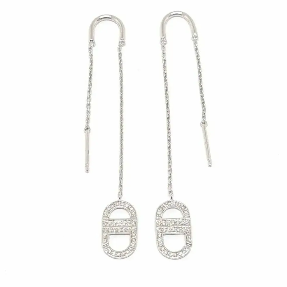 Pendants d'oreilles liens diamants or blanc