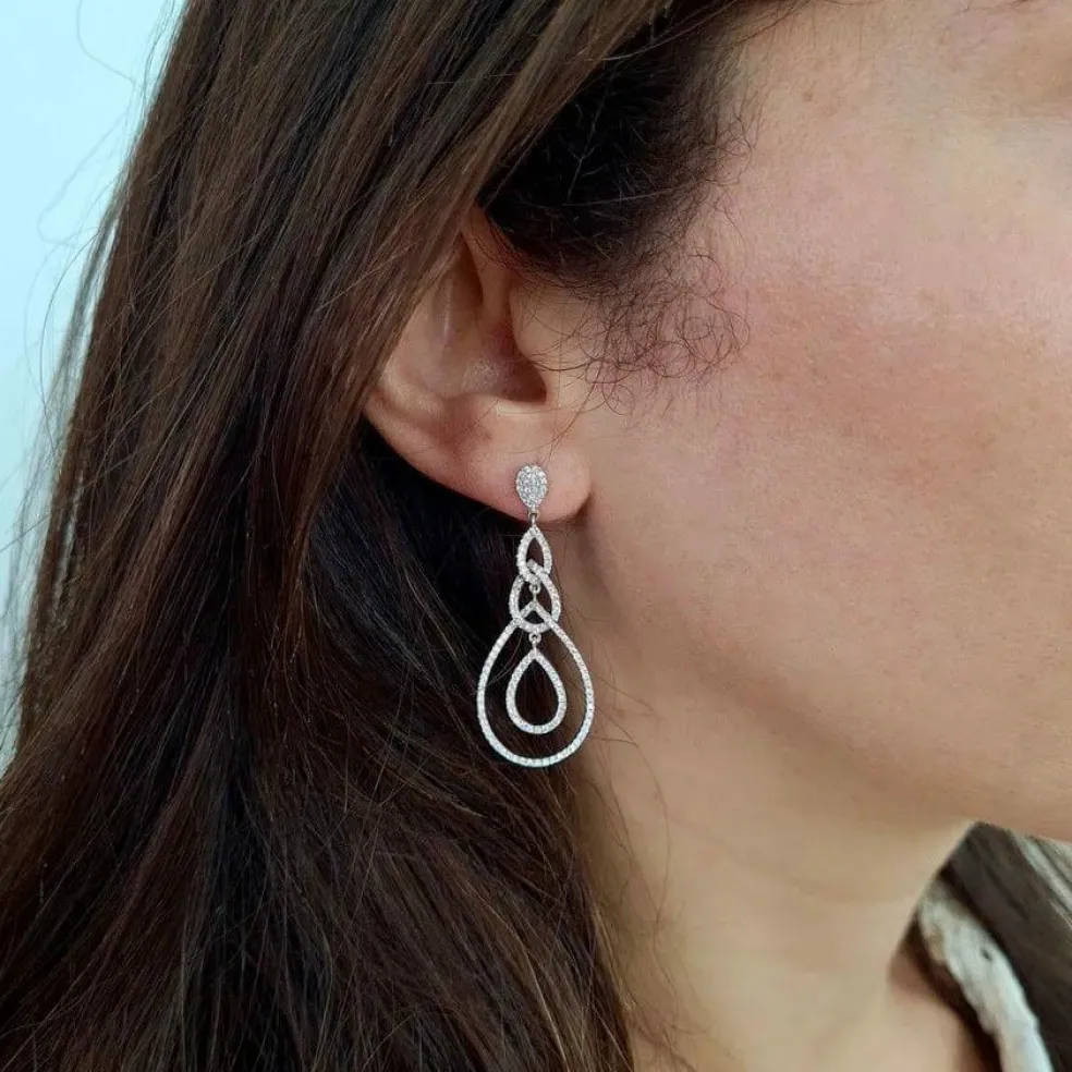 Pendants d'oreilles poire diamants or blanc
