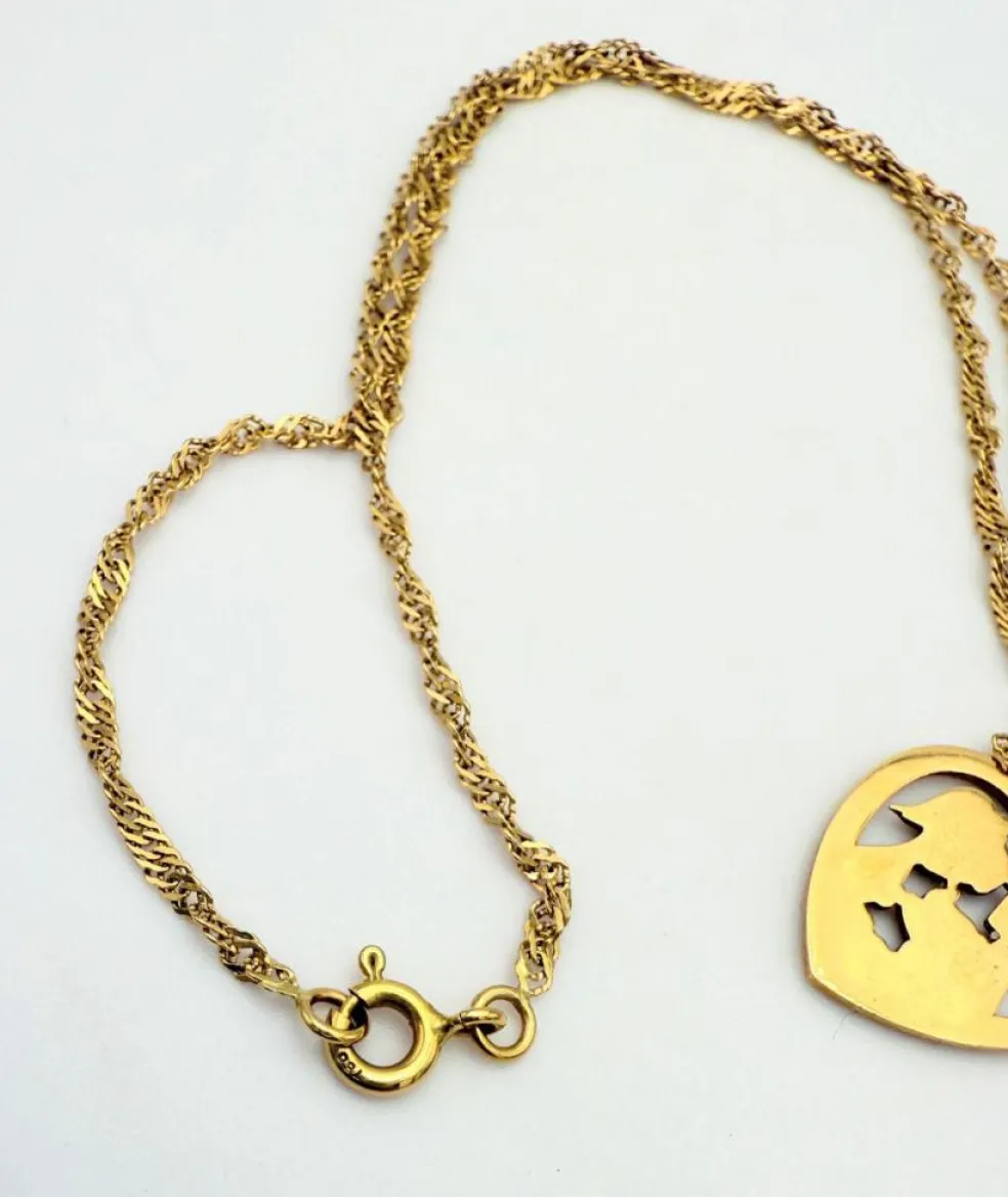 Pendentif amoureux de Peynet et sa chaine en or