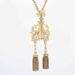 Pendentif ancien en or et ses pompons