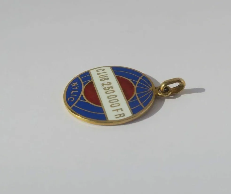Pendentif ancien globe terrestre New York Life insurance Company émail