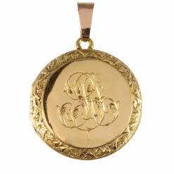 Pendentif ancien médaillon ciselé